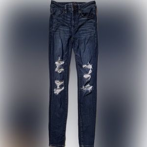 AMERICAN EAGLE NEXT LEVEL STRETCH DISTRESSED HI RISE JEGGING SIZE 4 LONG